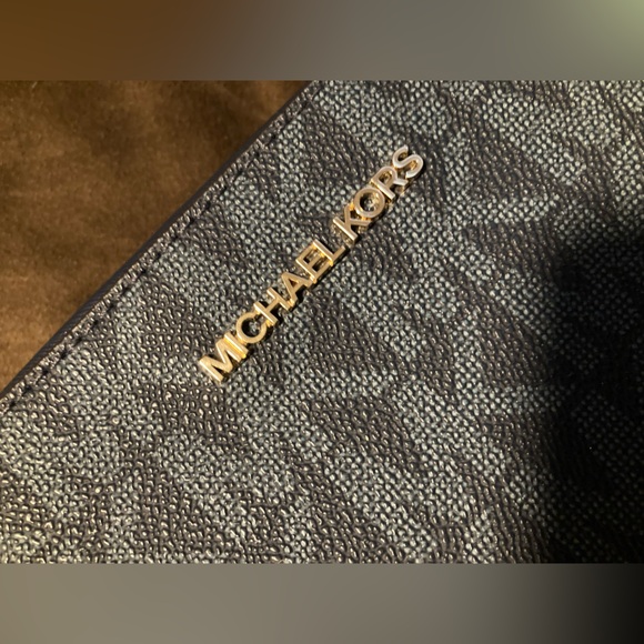 Michael Kors brand, dark blue, crossbody purse. - Picture 10 of 11